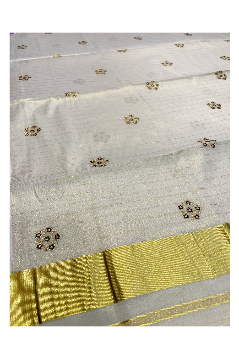 Kerala Tissue Kasavu Stripes Saree with Violet Floral Embroidery Design on Body