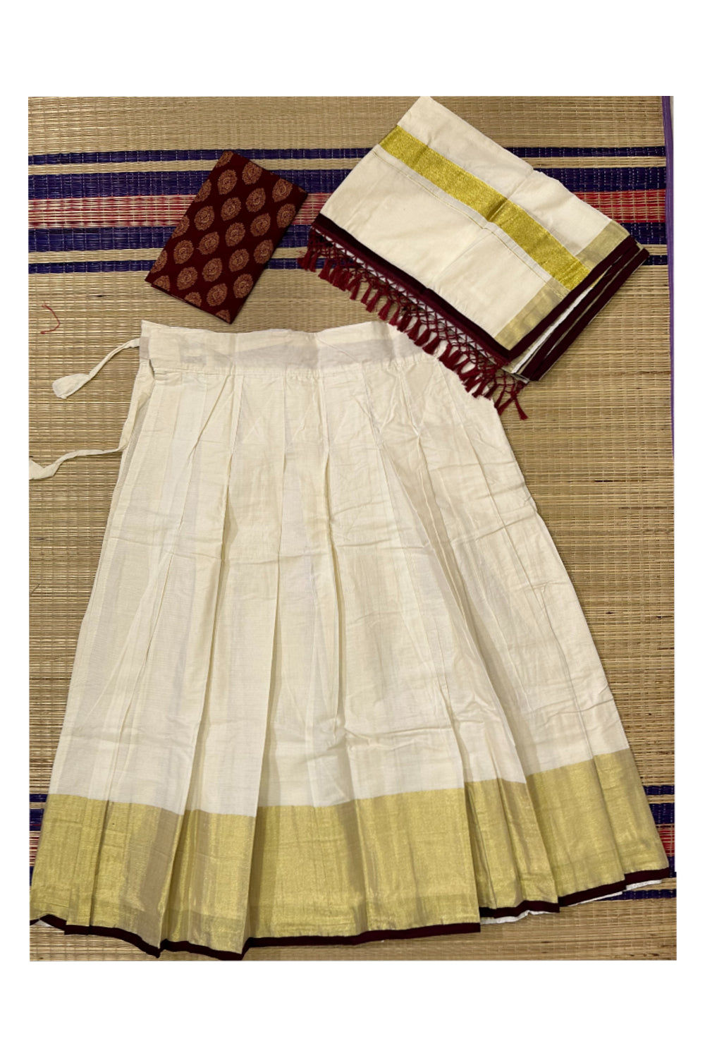 Semi Stitched Dhavani Set with Cotton Pavada and Maroon Woven Work Blouse Piece