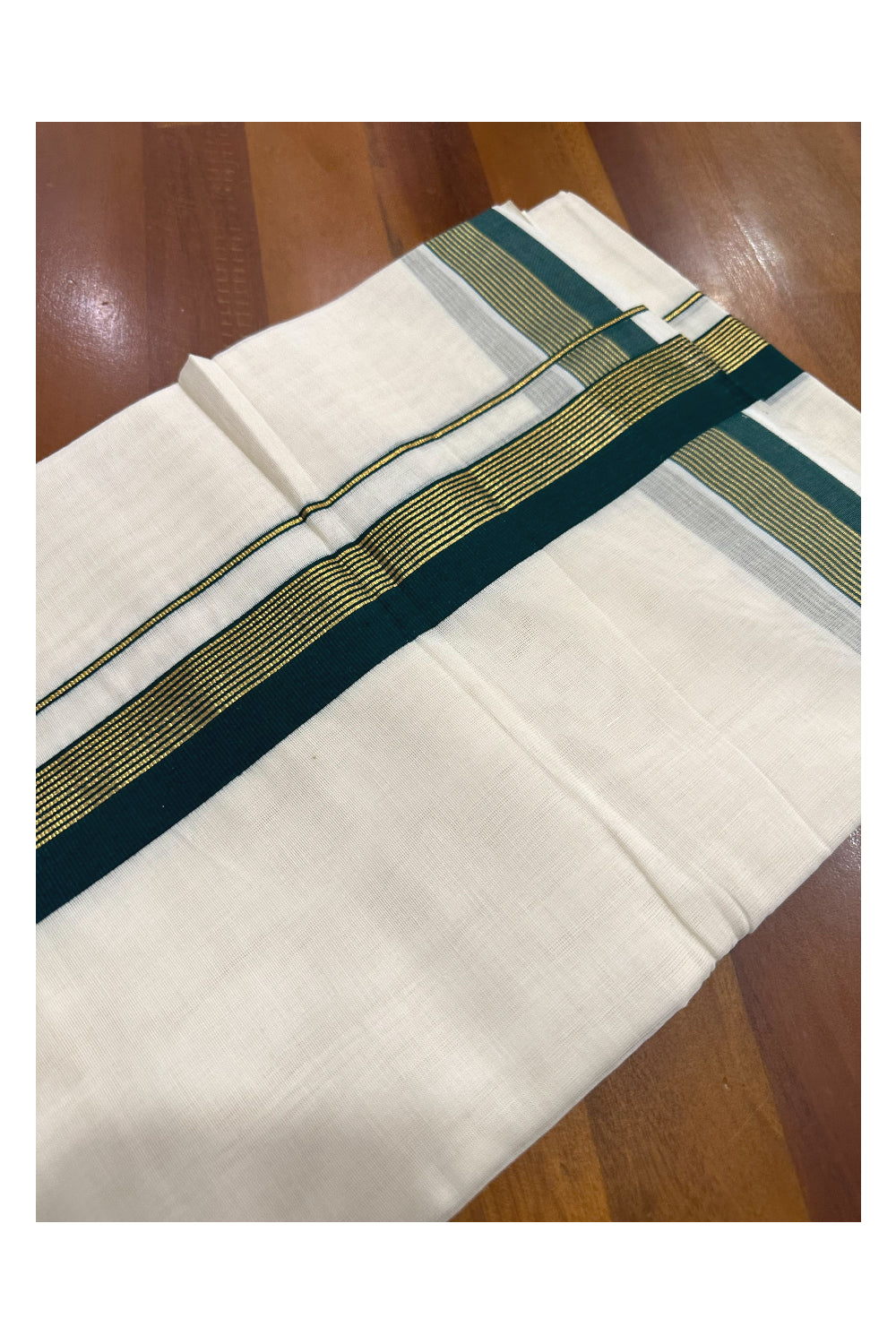 Southloom Premium Handloom Mundu with Dark Green and Kasavu Kara (Onam Mundu 2023)