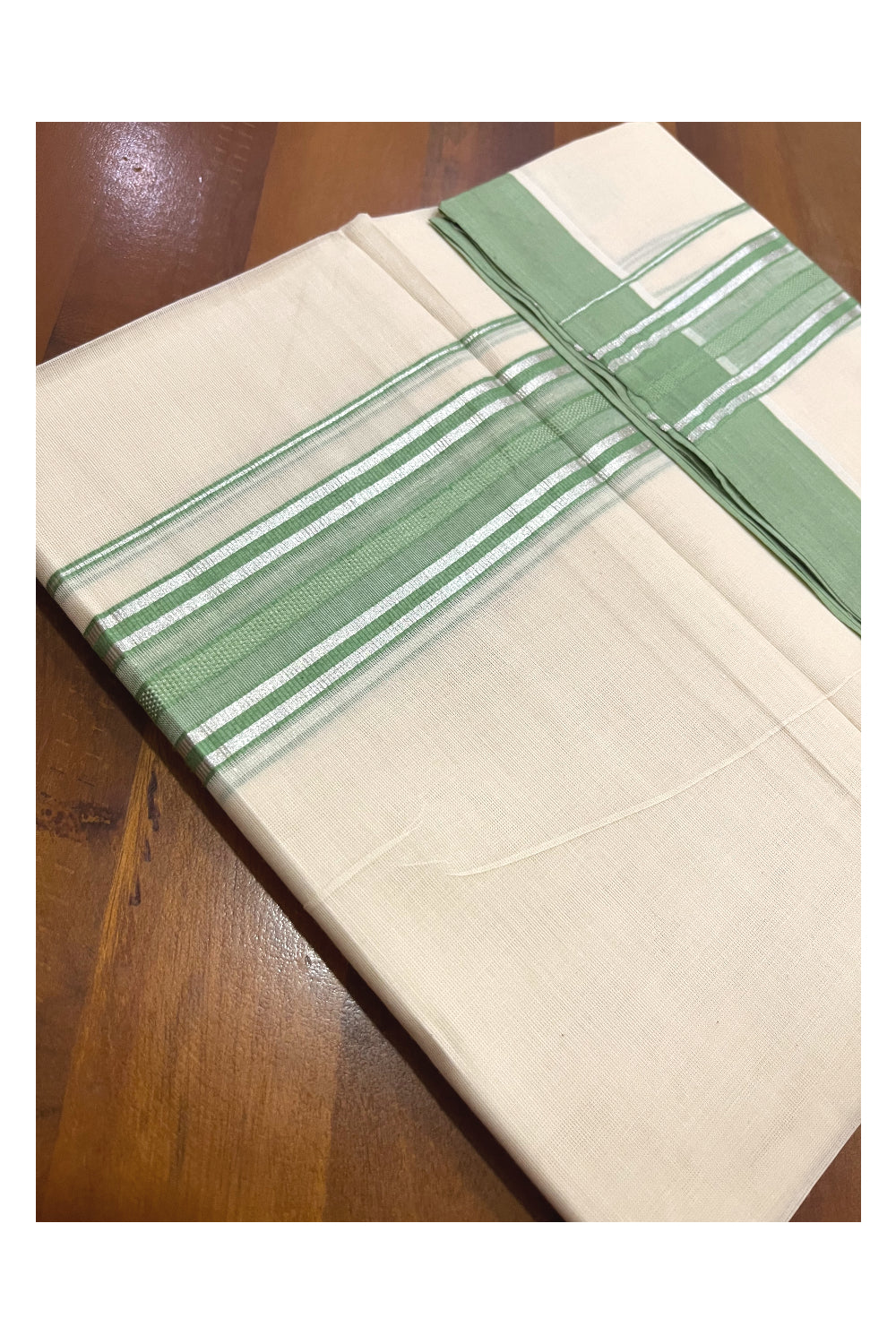 Pure Cotton 100x100 Double Mundu with Silver Kasavu and Light Green Kara (Onam Mundu 2023)