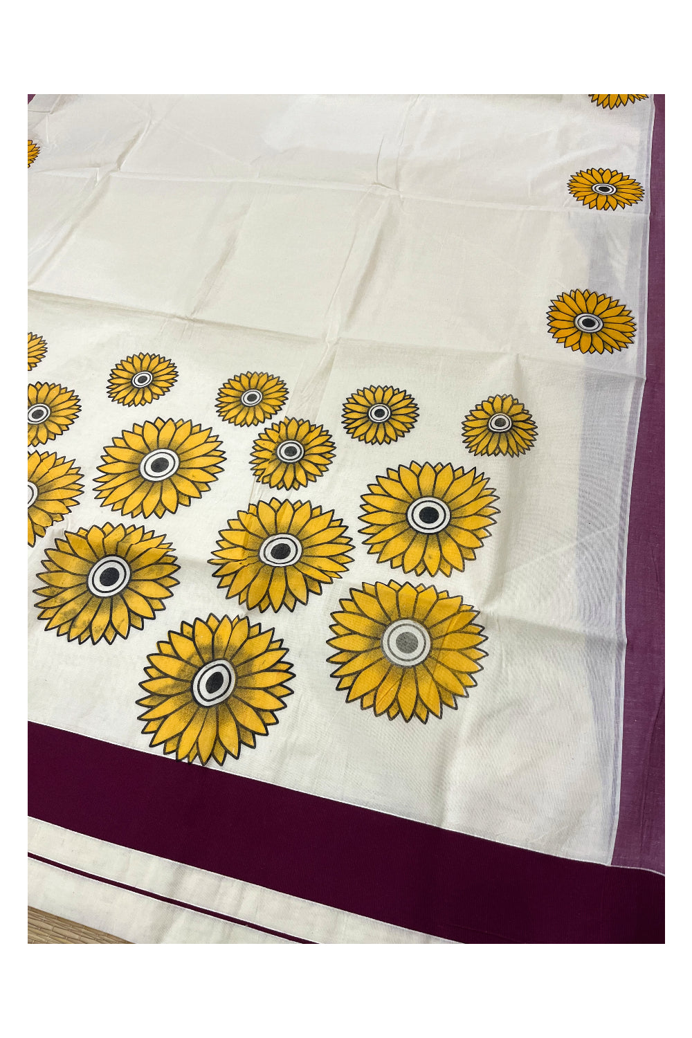 Kerala Pure Cotton Saree with Sunflower Prints on Body and Purple Border