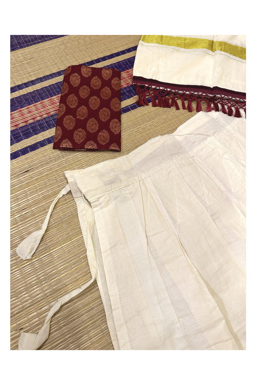 Semi Stitched Dhavani Set with Cotton Pavada and Maroon Woven Work Blouse Piece