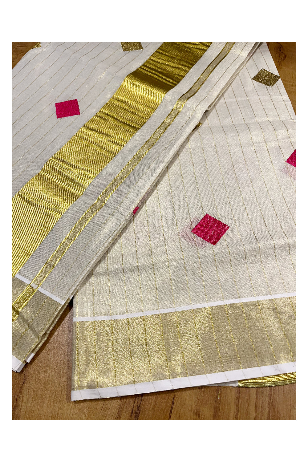 Kerala Tissue Kasavu Lines Saree with Pink and Golden Diagonal Woven Designs on Body and Pallu