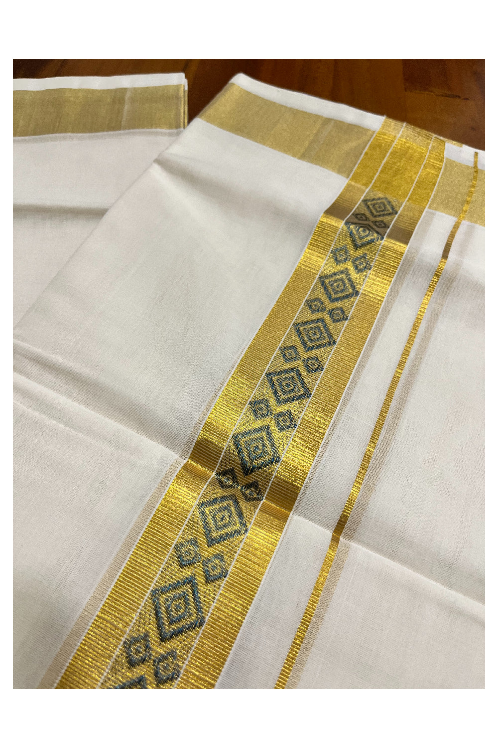 Southloom Premium Handloom Pure Cotton Mundu with Golden and Blue Kasavu Woven Border (Vishu 2024 Collection)