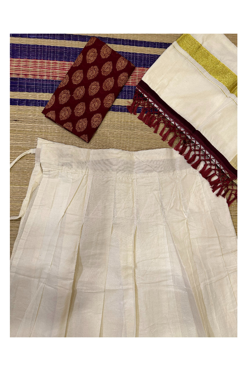 Semi Stitched Dhavani Set with Cotton Pavada and Maroon Woven Work Blouse Piece