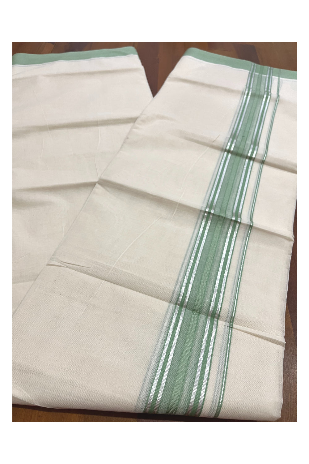 Pure Cotton 100x100 Double Mundu with Silver Kasavu and Light Green Kara (Onam Mundu 2023)