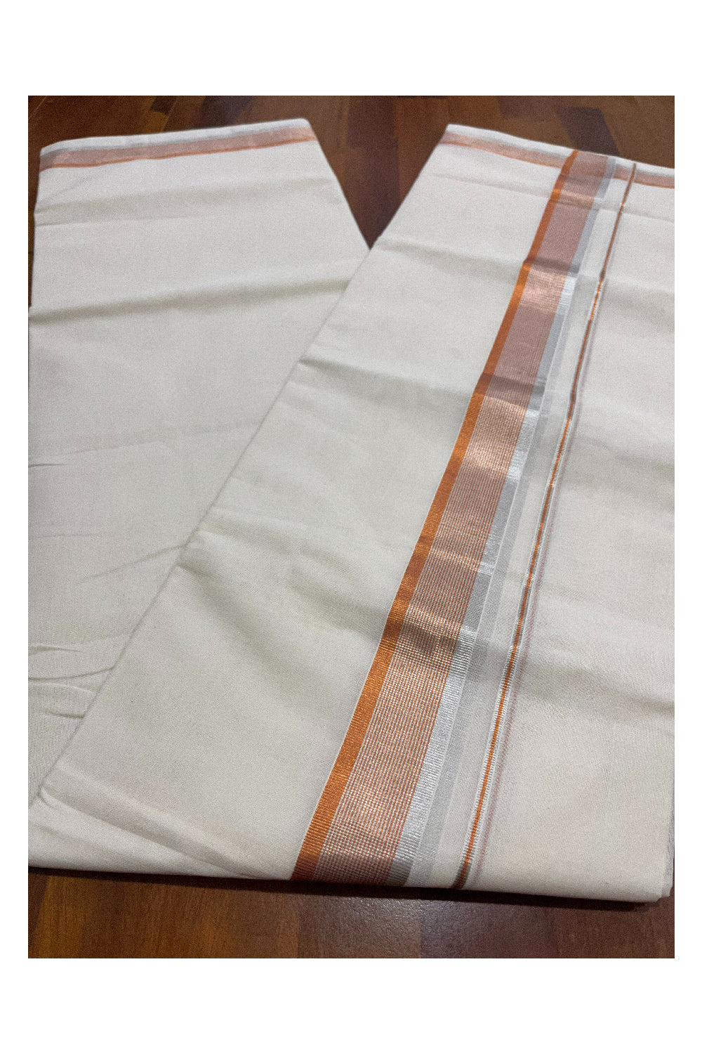 Southloom Premium Handloom Pure Cotton Mundu with Silver and Orange Kasavu Border (Onam Mundu 2023)