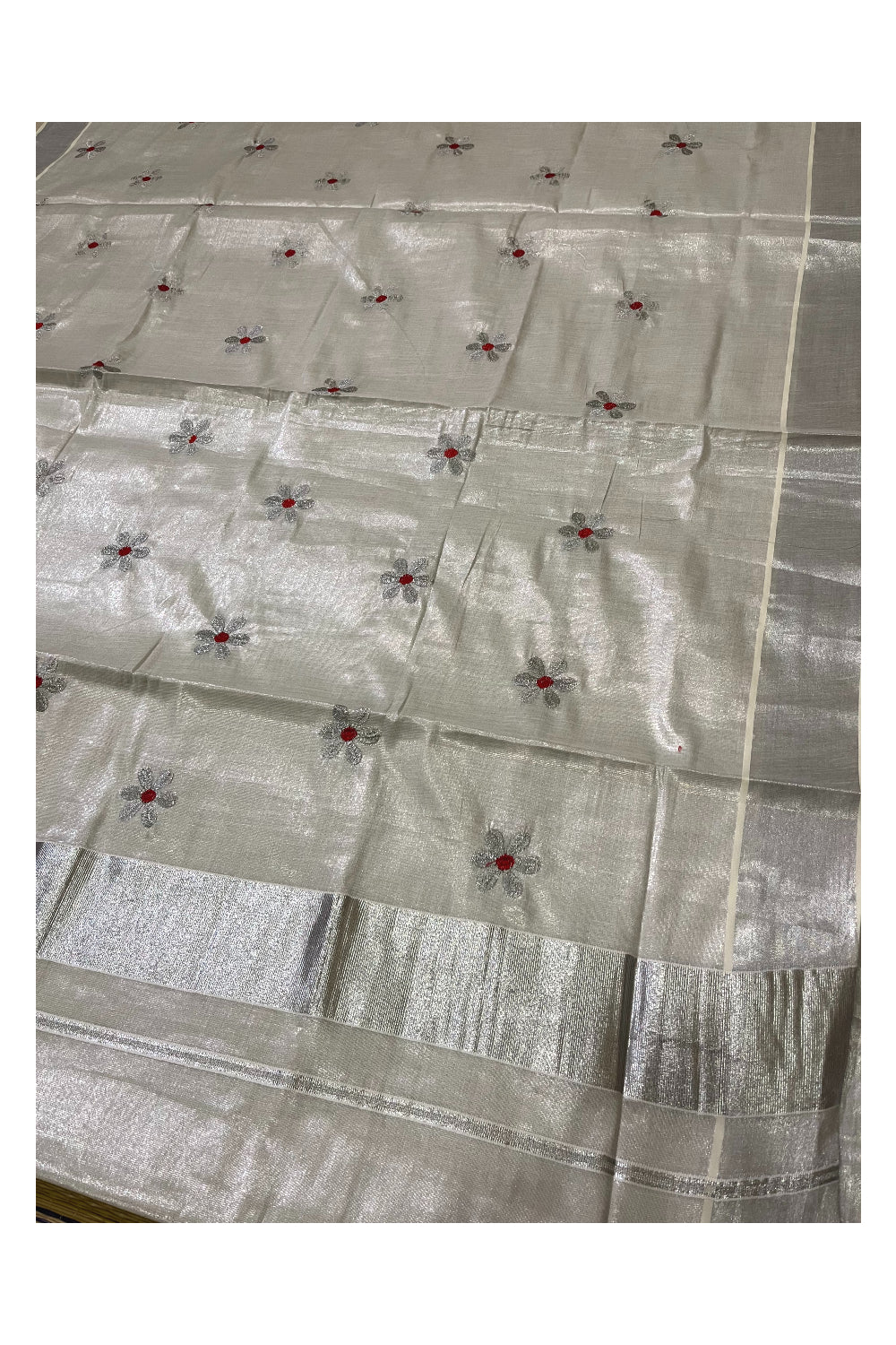 Kerala Silver Tissue Kasavu Saree with Floral Embroidery Works on Body and Red Blouse Piece