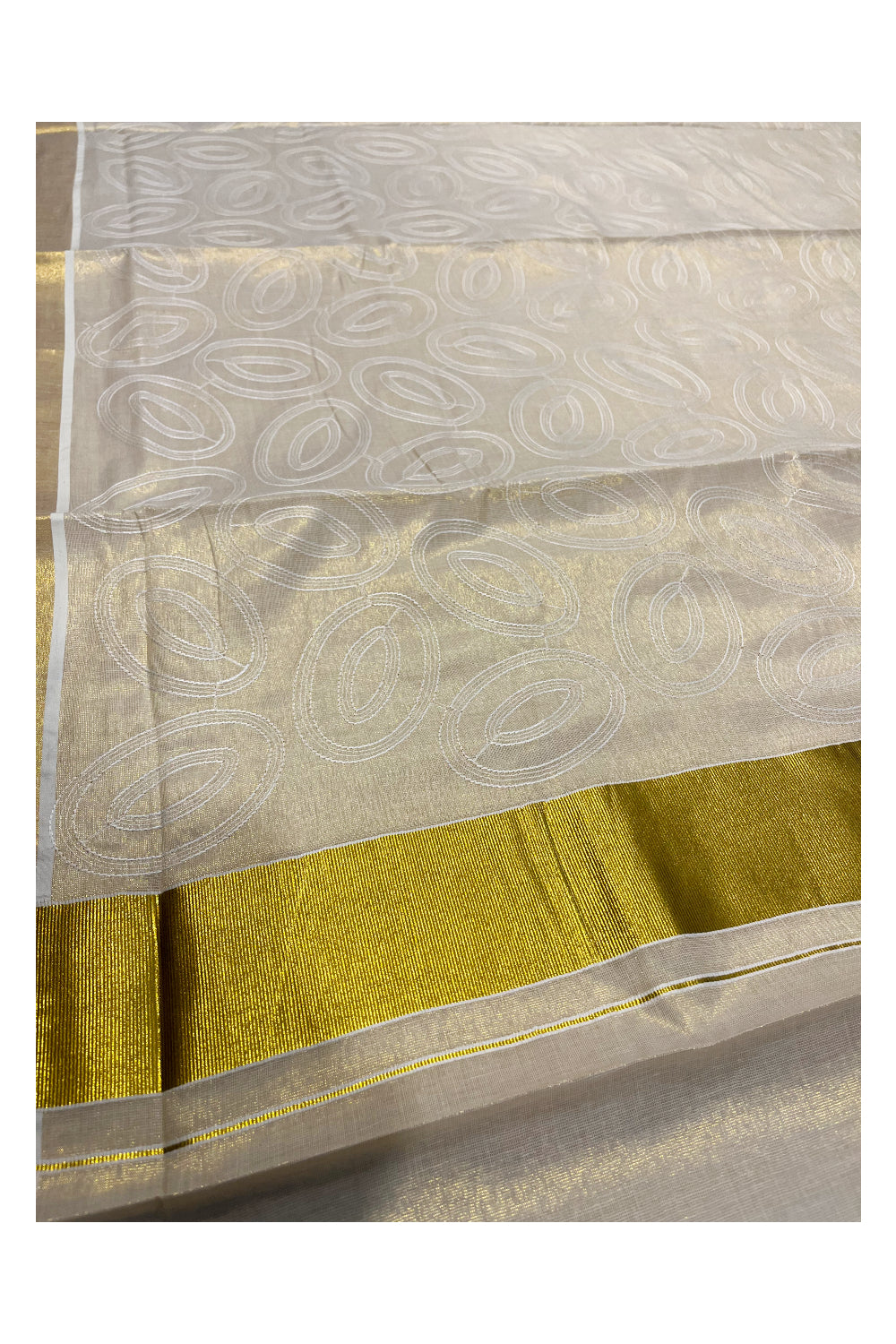 Kerala Tissue Kasavu Saree With White Floral Embroidery Works