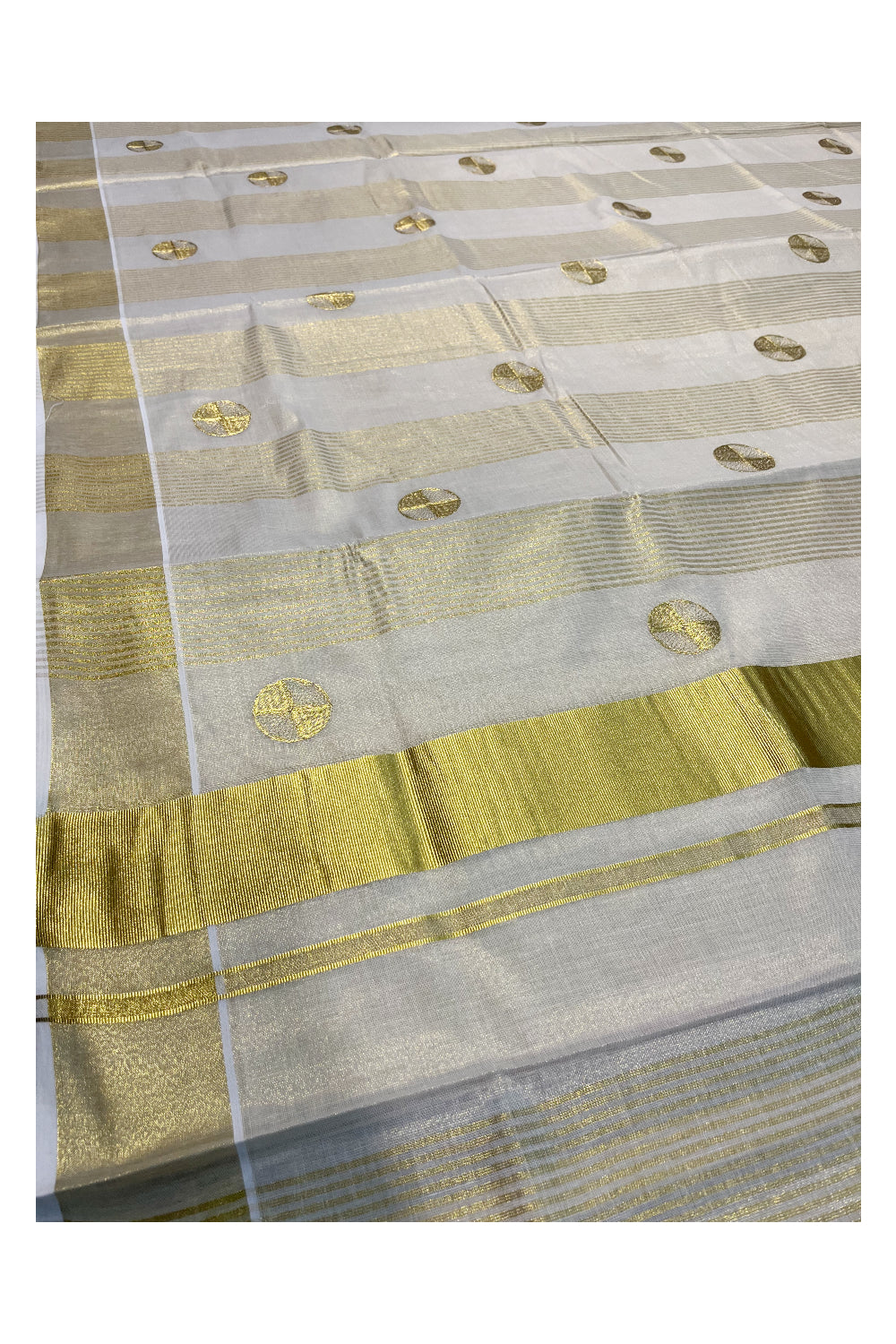 Kerala Tissue Kasavu Lines Saree with Golden  Polka works across the Body