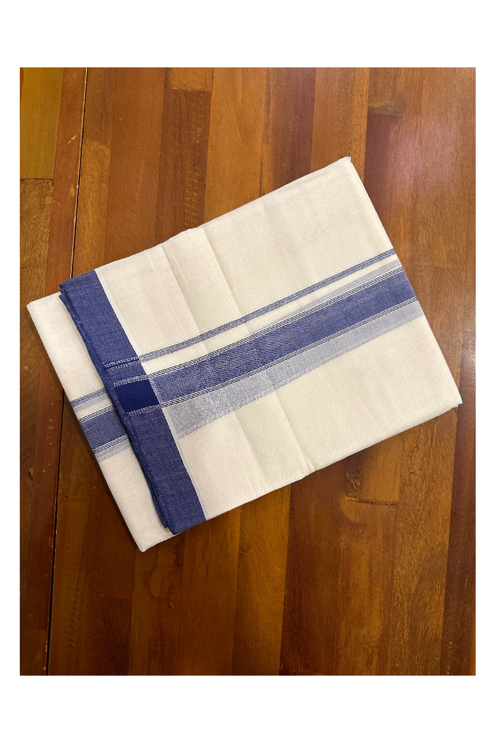 Southloom Premium Handloom Mundu with Blue Kara (Onam Mundu 2023)