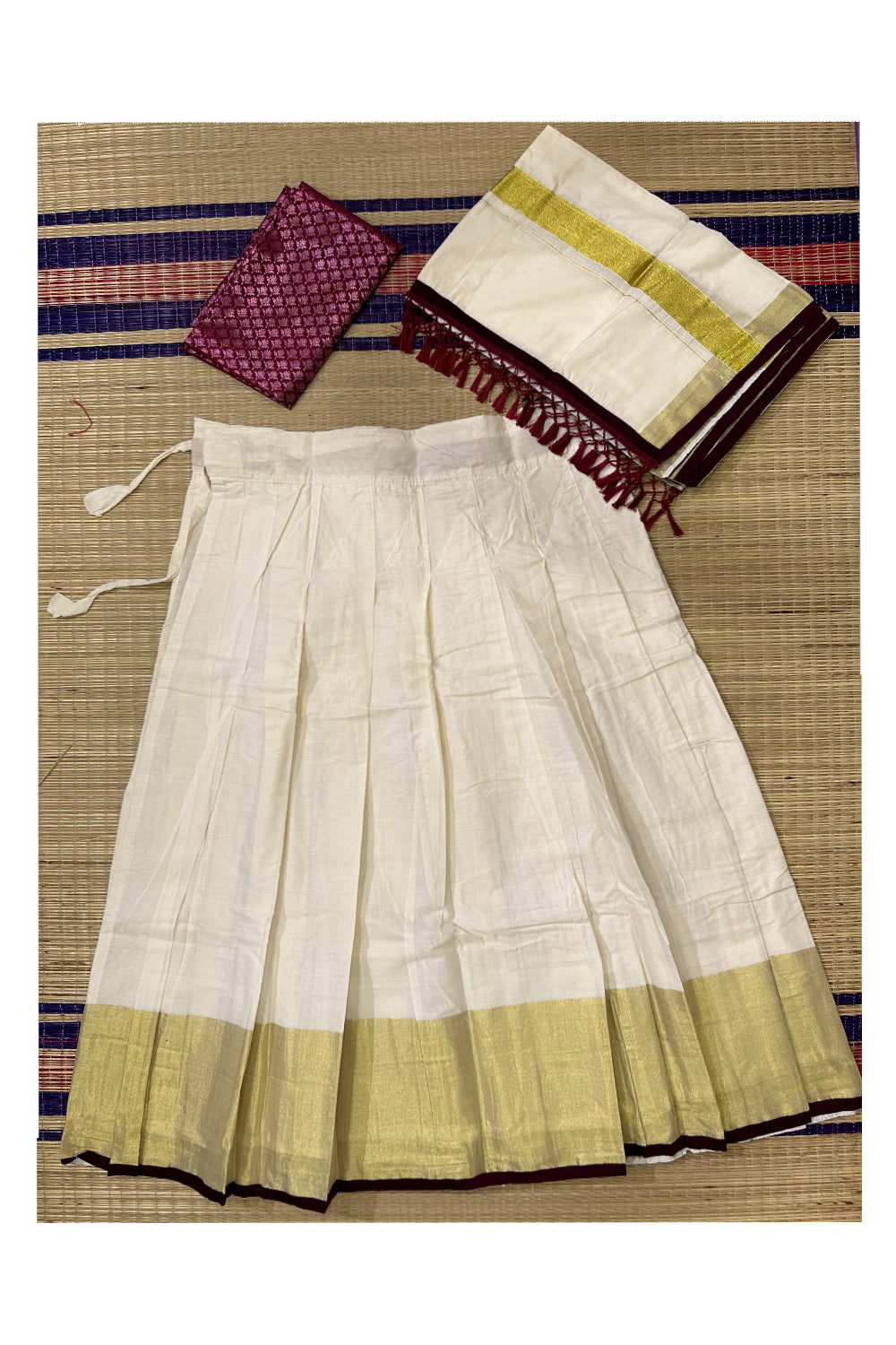 Semi Stitched Dhavani Set with Cotton Pavada and Maroon Woven Work Blouse Piece