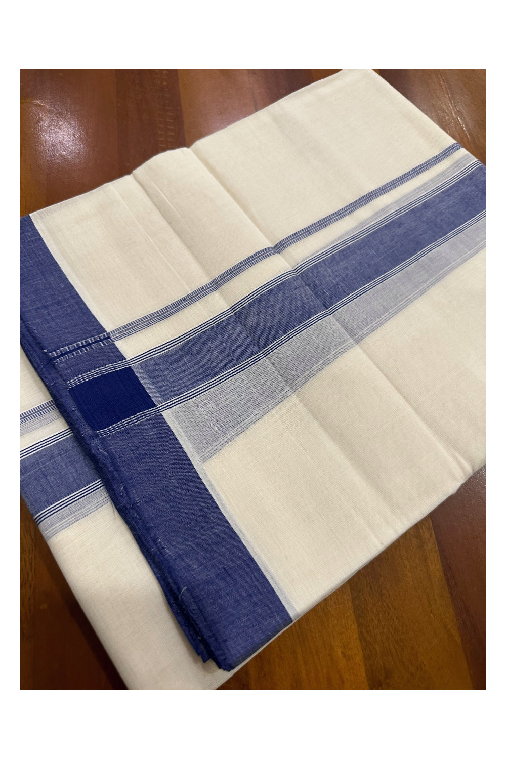 Southloom Premium Handloom Mundu with Blue Kara (Onam Mundu 2023)