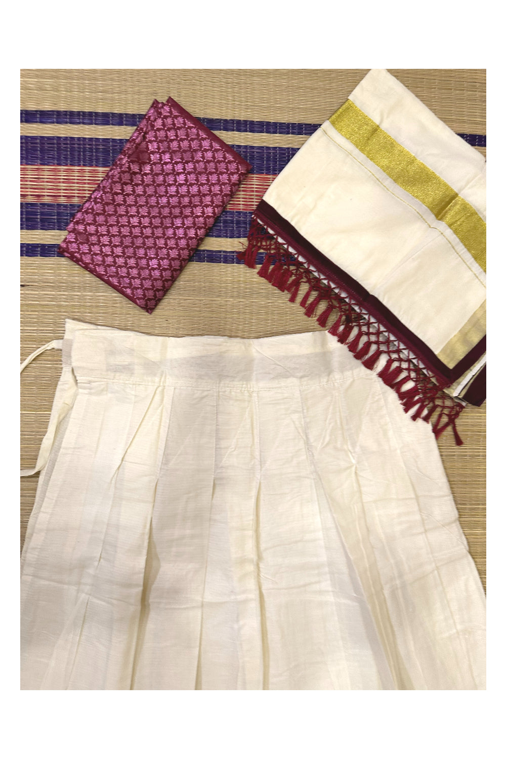 Semi Stitched Dhavani Set with Cotton Pavada and Maroon Woven Work Blouse Piece