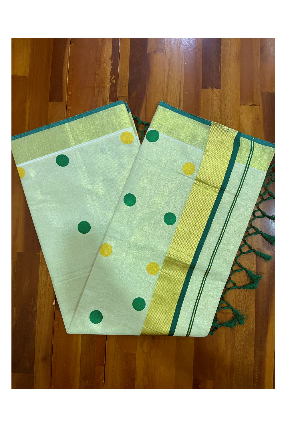 Kerala Tissue Kasavu Saree with Light Green and Golden Polka Prints and Tassels Works