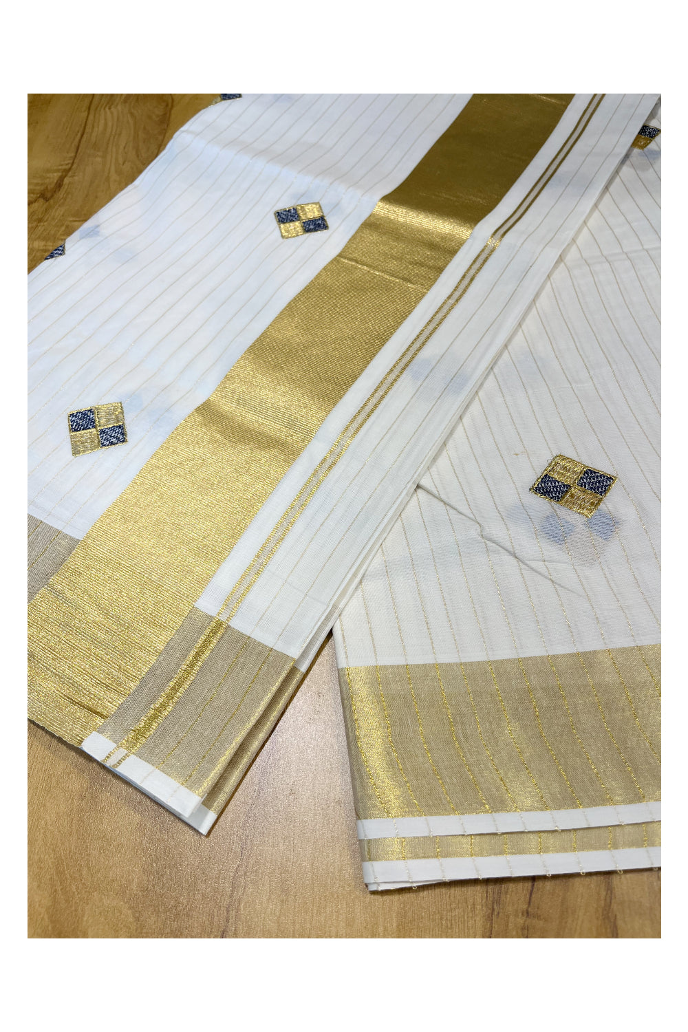 Kerala Cotton Kasavu Lines Saree with Blue and Golden Diagonal Embroidery Work