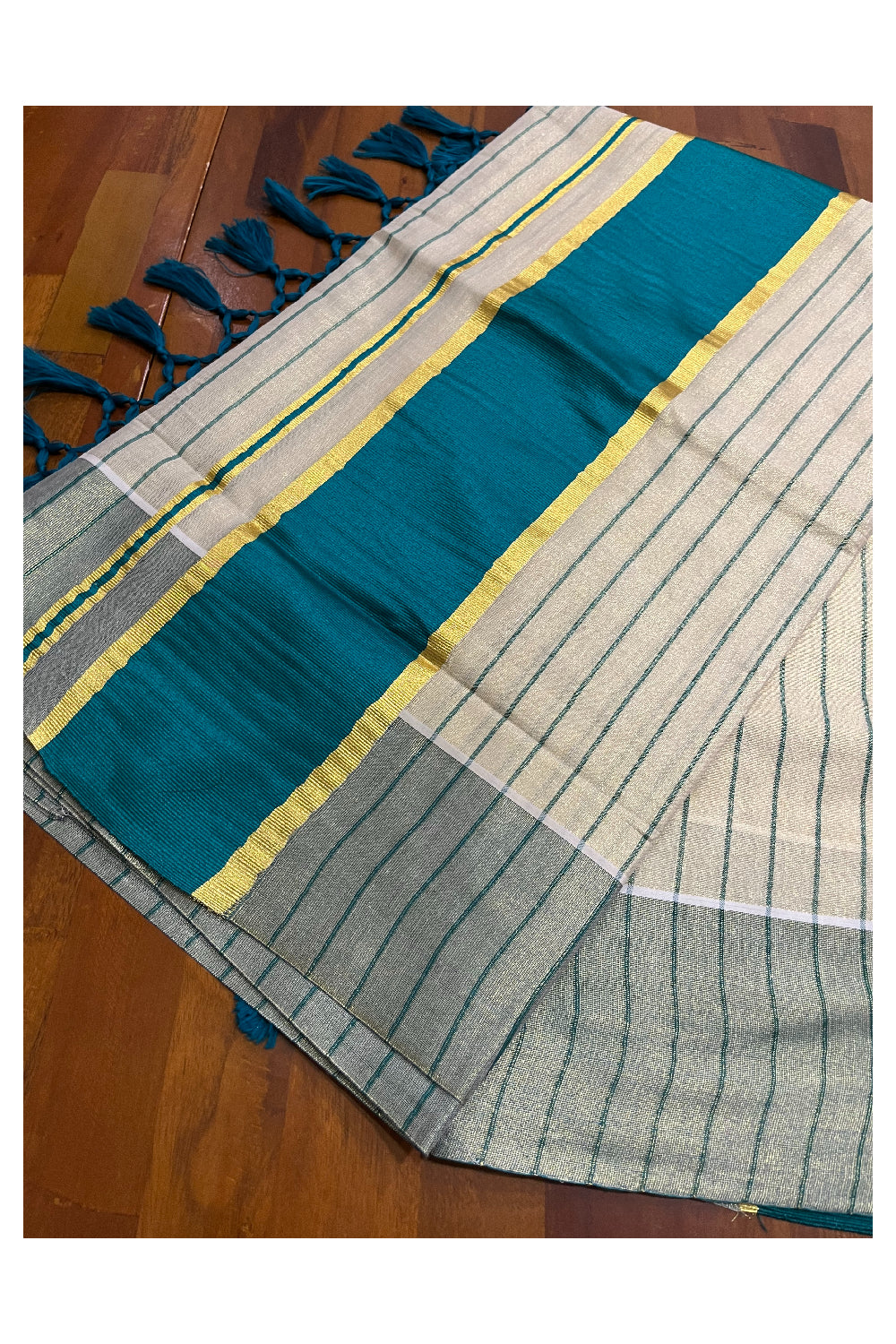 Kerala Tissue Green Striped Saree with Kasavu Border and Tassels Works (Vishu 2024 Collection)