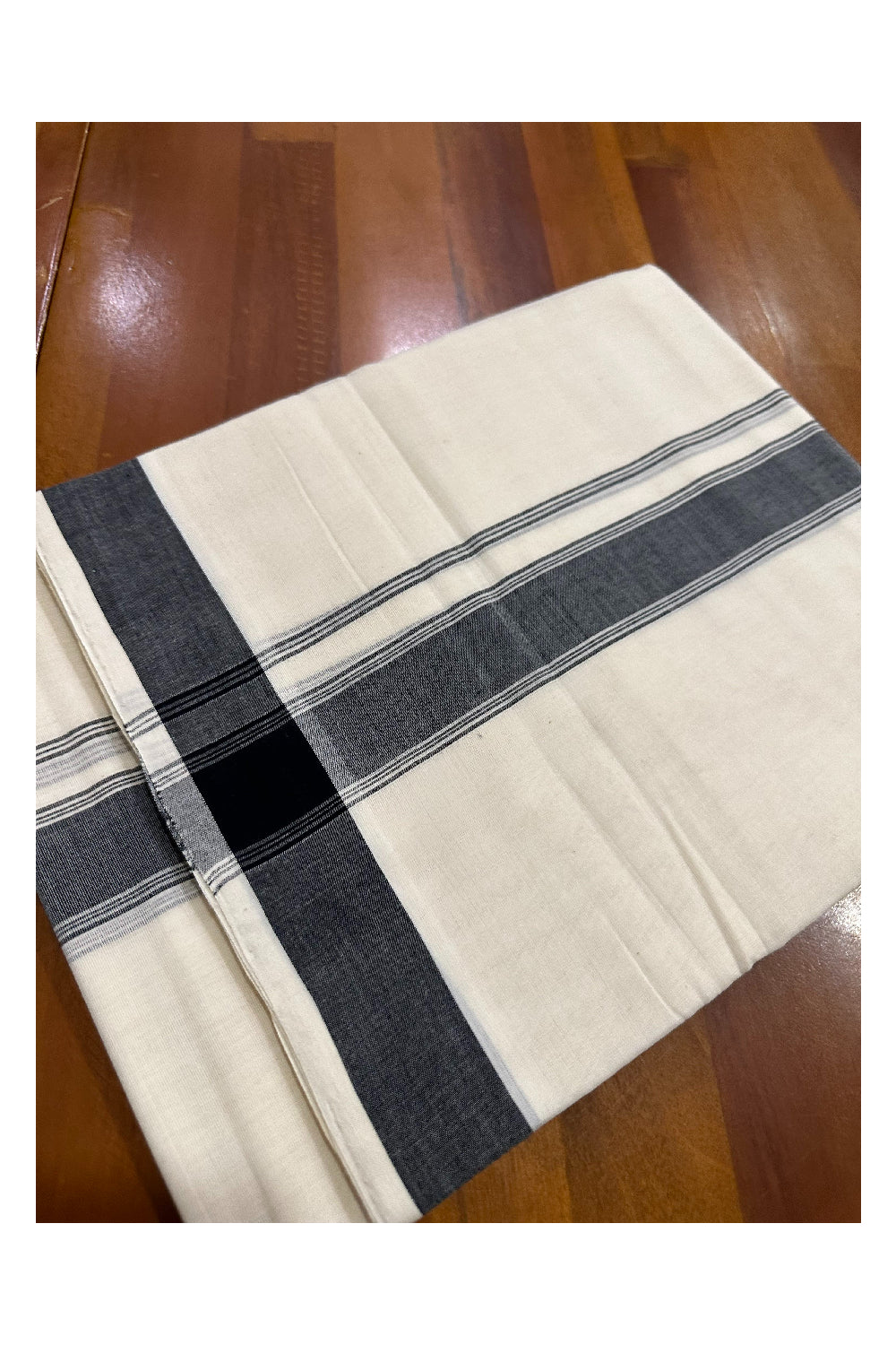 Southloom Premium Handloom Mundu with Black Kara