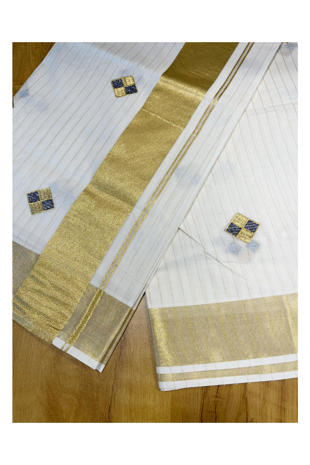 Kerala Cotton Kasavu Lines Saree with Blue and Golden Diagonal Embroidery Work