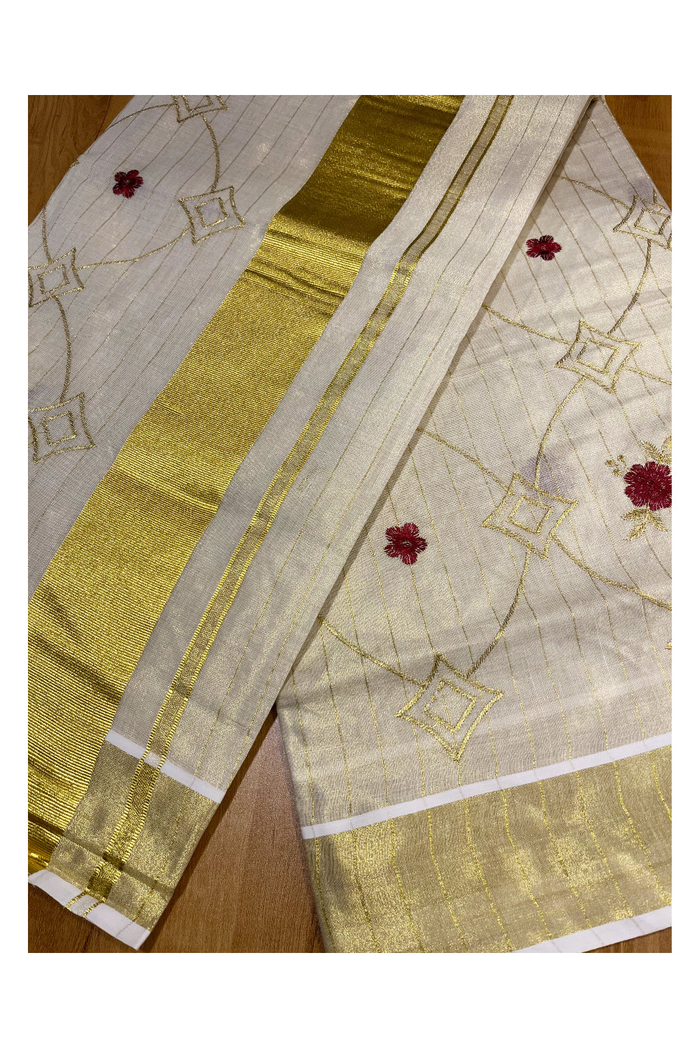 Kerala Tissue Kasavu Stripes Saree with Maroon Floral Embroidery Design on Body