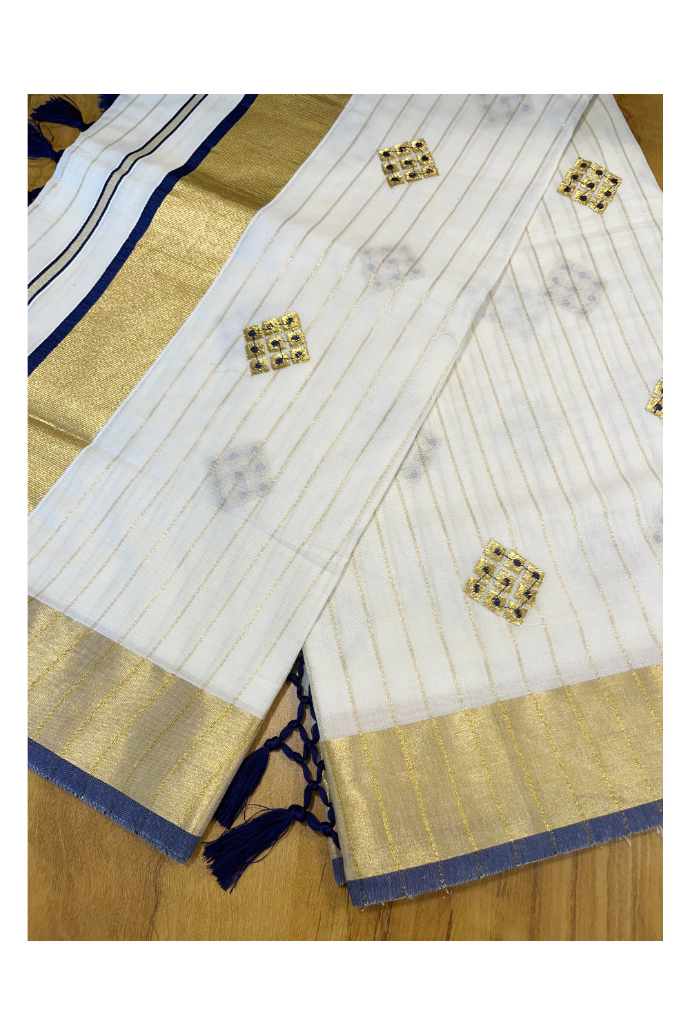 Kerala Cotton Kasavu Stripes Saree with Blue Floral Embroidery Design on Body