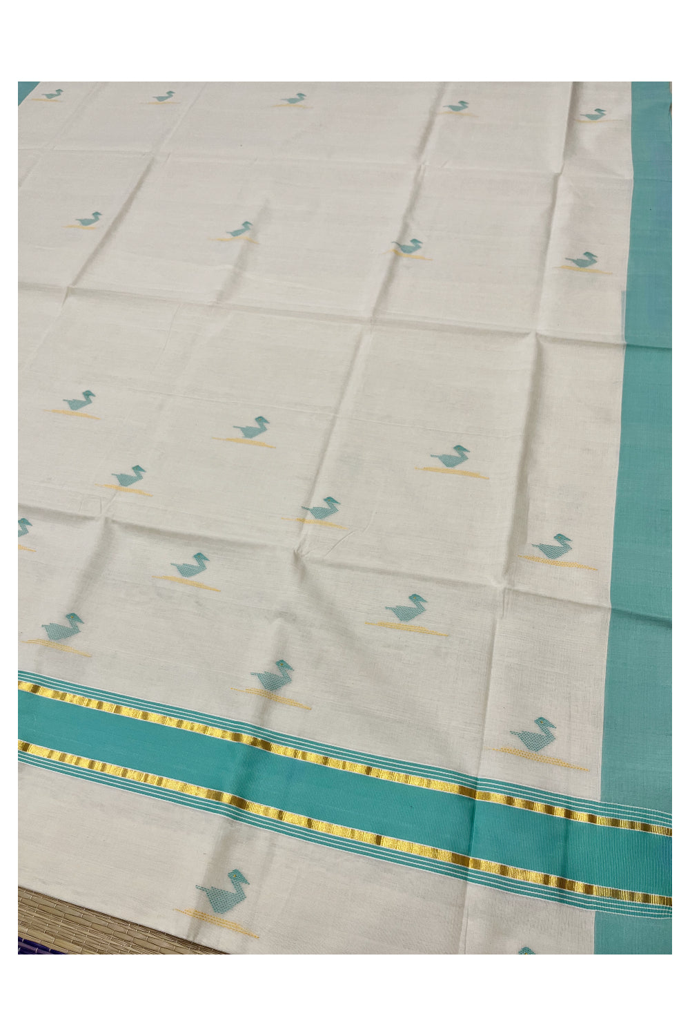 Southloom Premium Balaramapuram Unakkupaavu Handloom Cotton Butta Saree with Turquoise and Kasavu Border (Vishu 2024 Collection)