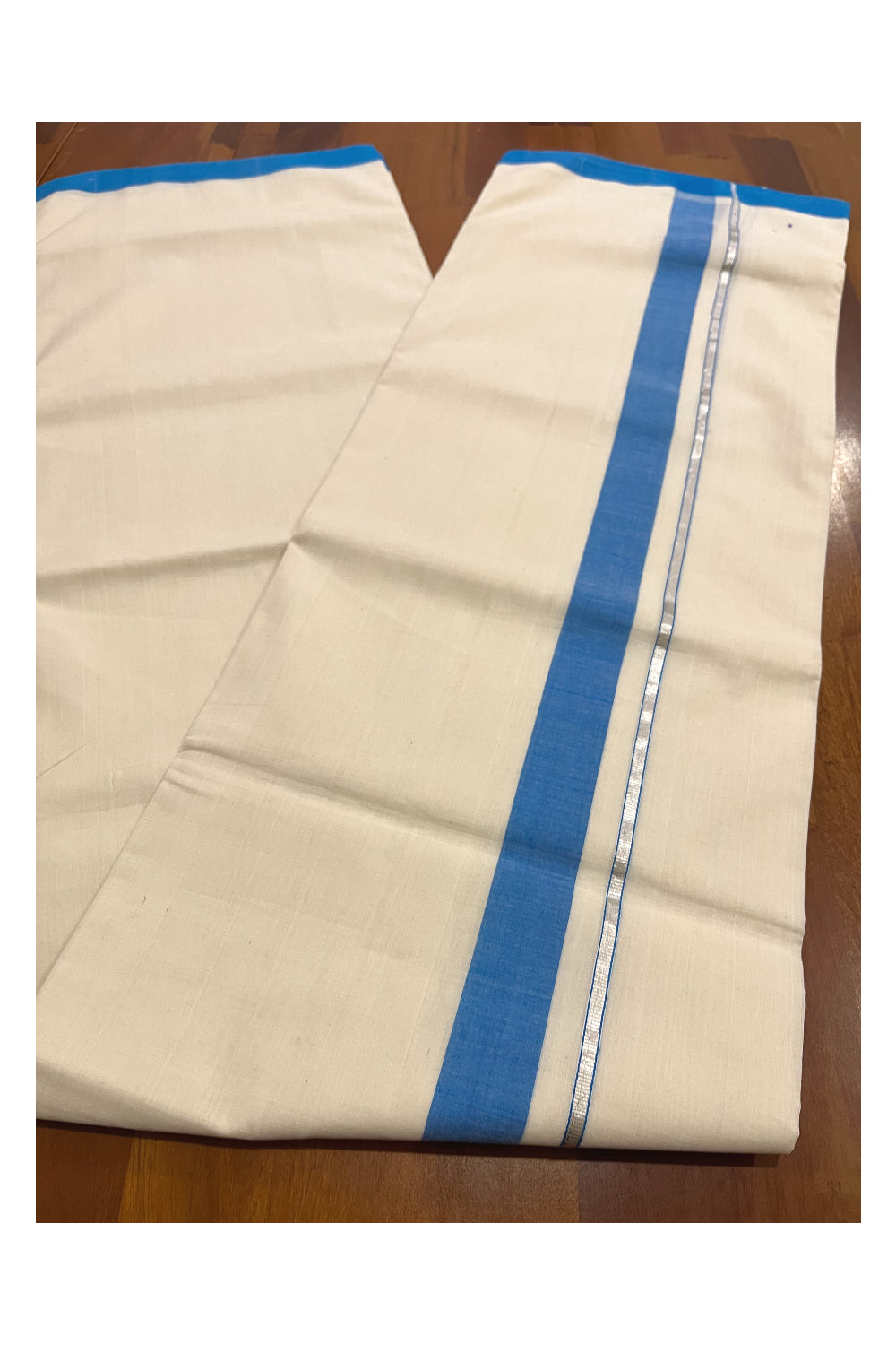 Southloom Premium Balaramapuram Unakkupaavu Handloom Mundu with Blue and Silver Kasavu Border (South Indian Kerala Dhoti)