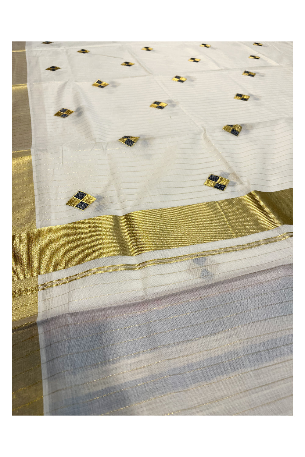 Kerala Cotton Kasavu Lines Saree with Blue and Golden Diagonal Embroidery Work