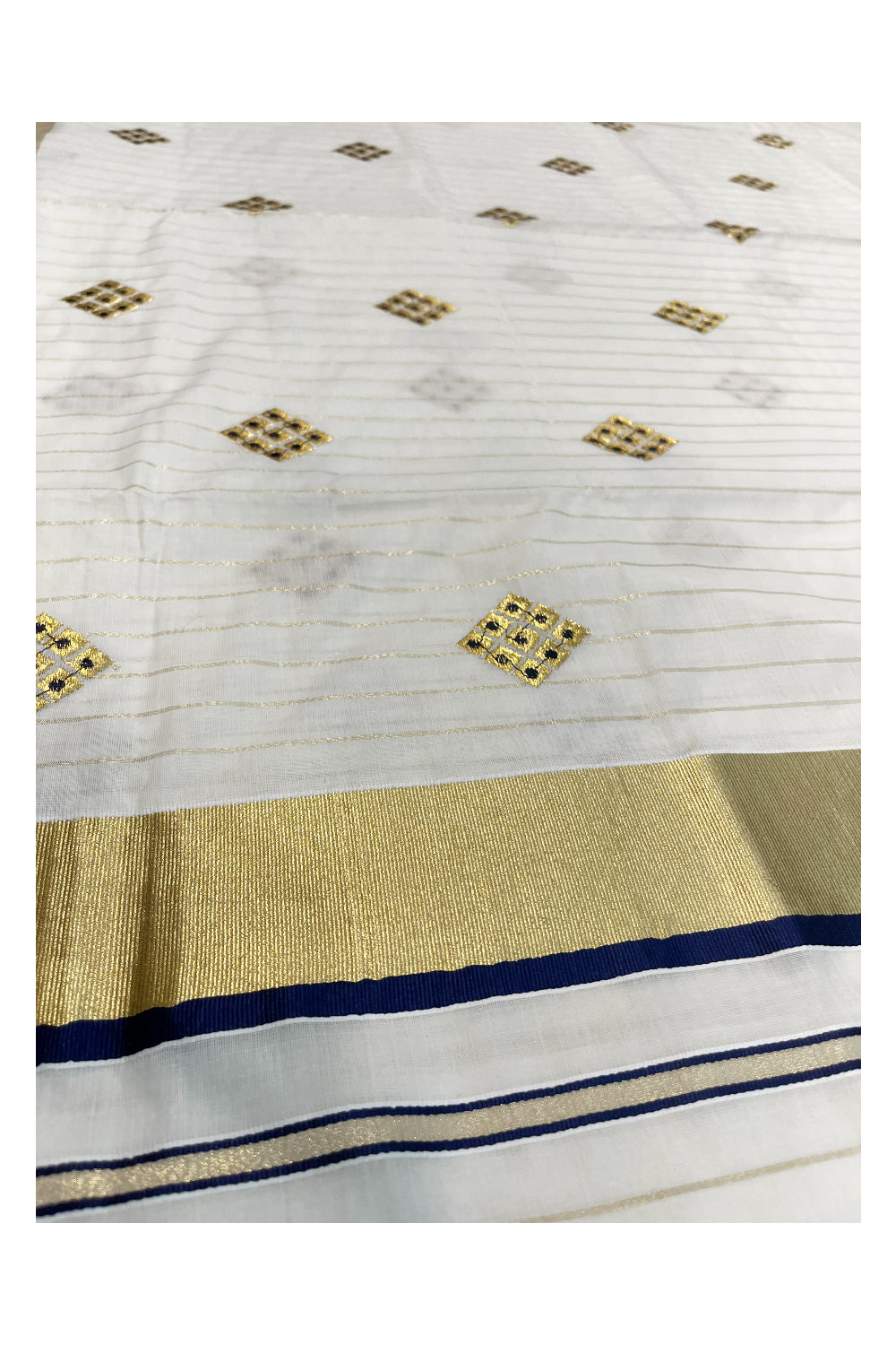 Kerala Cotton Kasavu Stripes Saree with Blue Floral Embroidery Design on Body