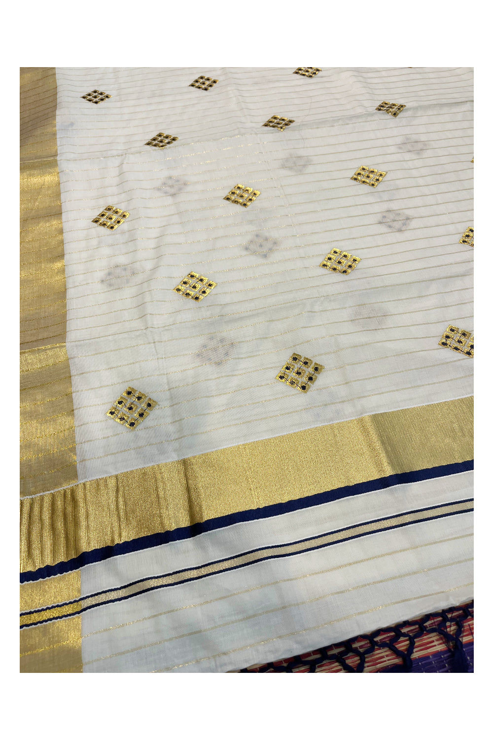 Kerala Cotton Kasavu Stripes Saree with Blue Floral Embroidery Design on Body