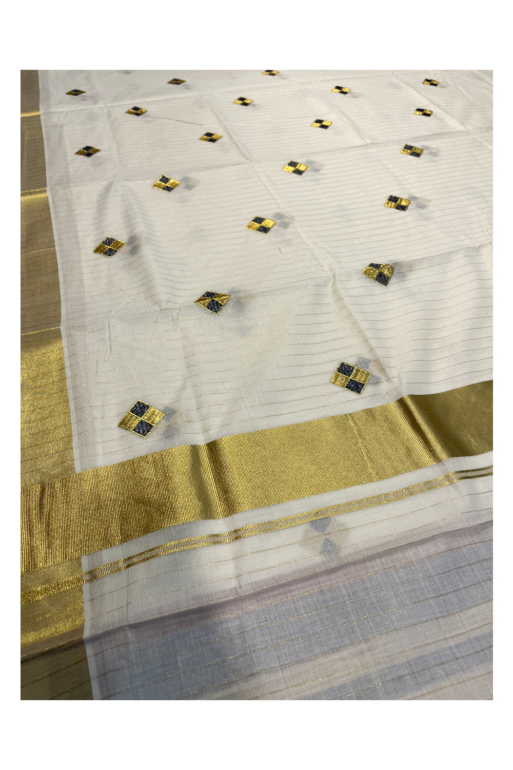 Kerala Cotton Kasavu Lines Saree with Blue and Golden Diagonal Embroidery Work