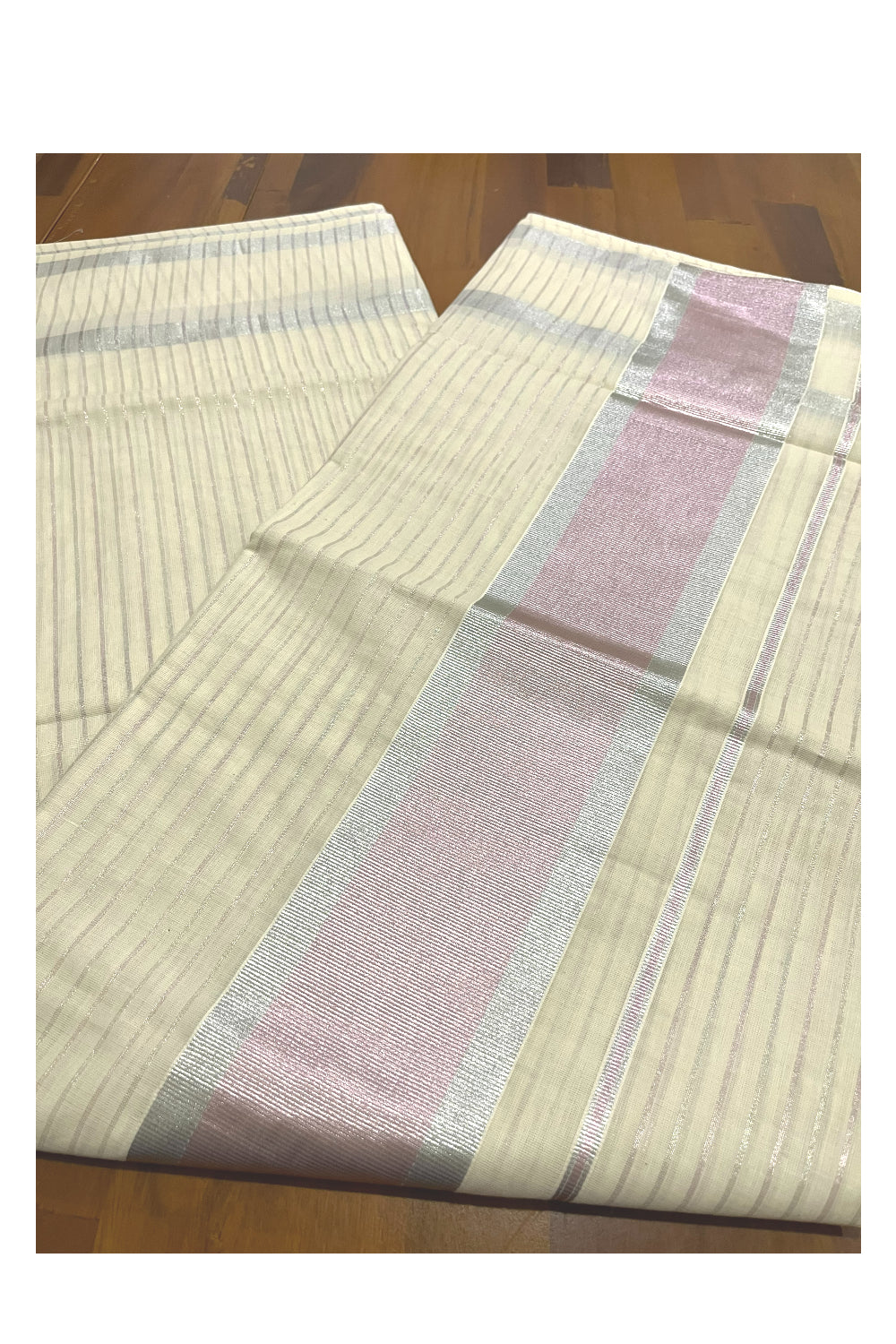 Pure Cotton Kerala Saree with Silver and Light Pink Kasavu Lines Across Body