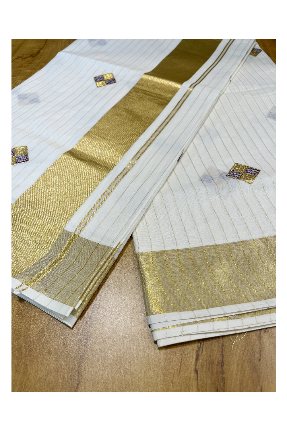 Kerala Cotton Kasavu Lines Saree with Violet and Golden Diagonal Embroidery Work