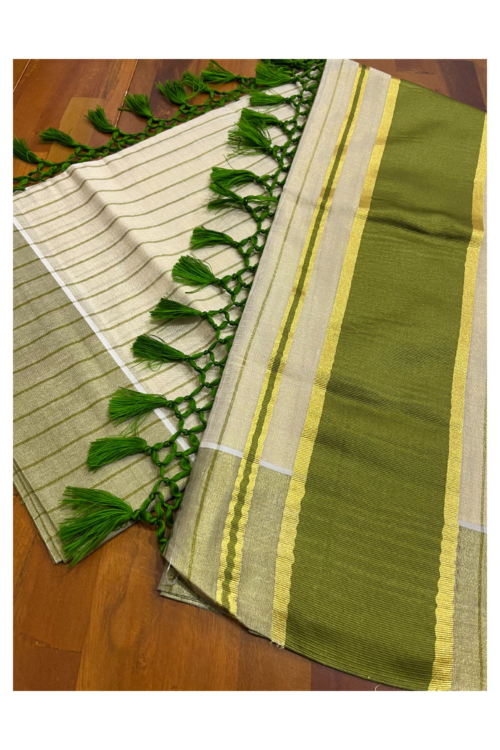 Kerala Tissue Light Green Striped Saree with Kasavu Border and Tassels Works (Vishu 2024 Collection)
