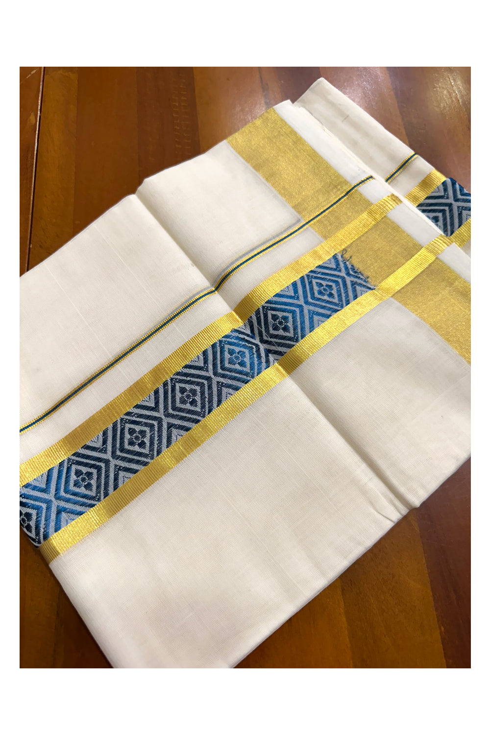 Southloom Premium Handloom Pure Cotton Mundu with Golden and Blue Kasavu Woven Border