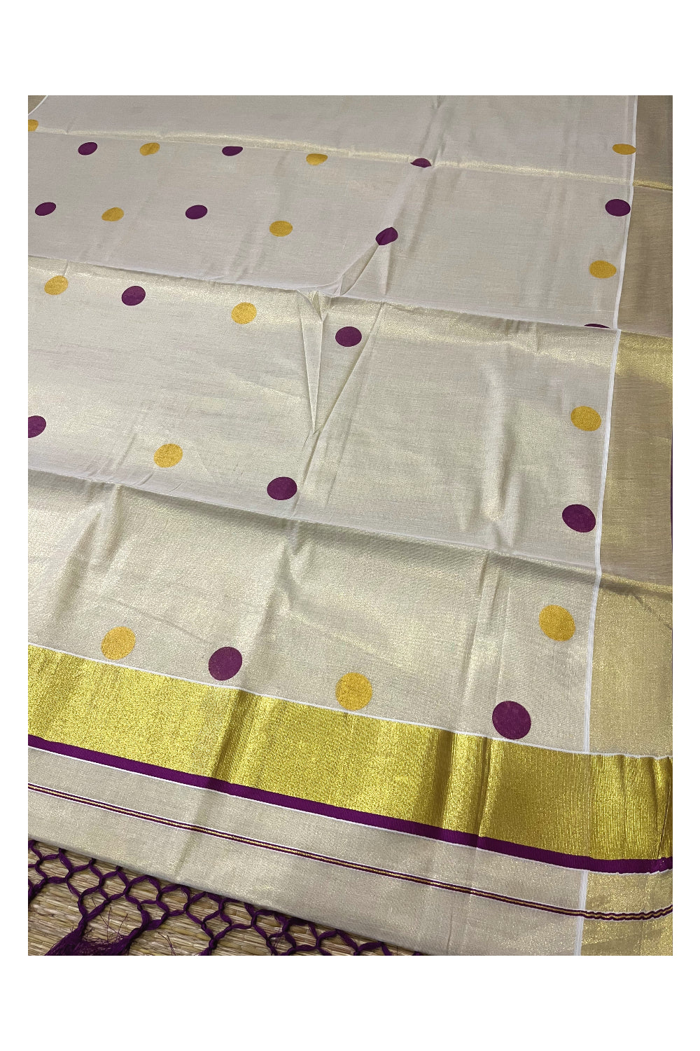 Kerala Tissue Kasavu Saree with Purple and Golden Polka Prints and Tassels Works