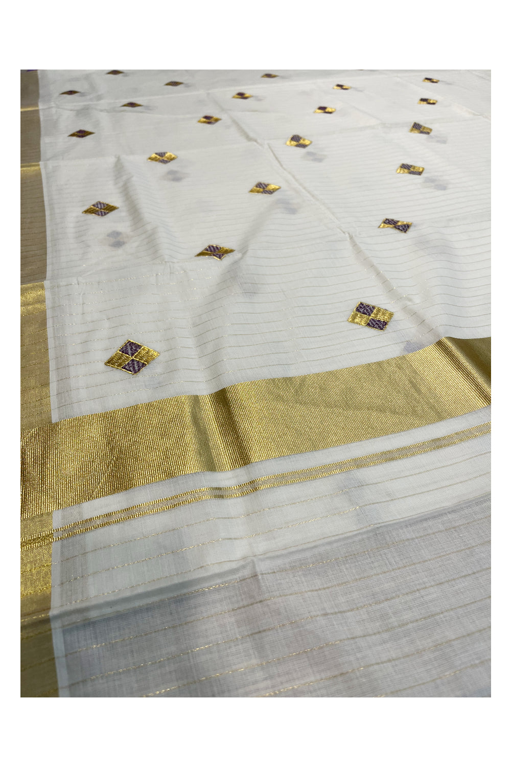 Kerala Cotton Kasavu Lines Saree with Violet and Golden Diagonal Embroidery Work