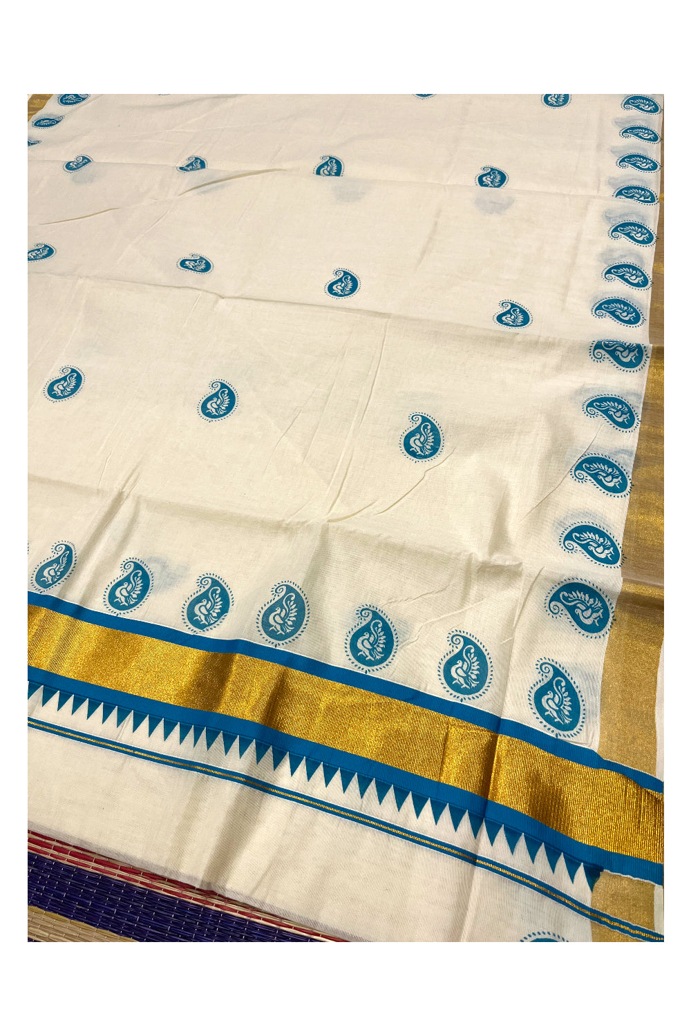 Pure Cotton Kerala Kasavu Saree with Blue Paisley Peacock Block Prints on Body and Kasavu Border