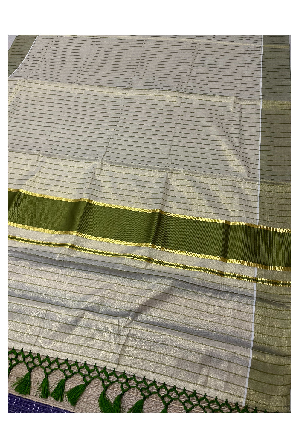Kerala Tissue Light Green Striped Saree with Kasavu Border and Tassels Works (Vishu 2024 Collection)