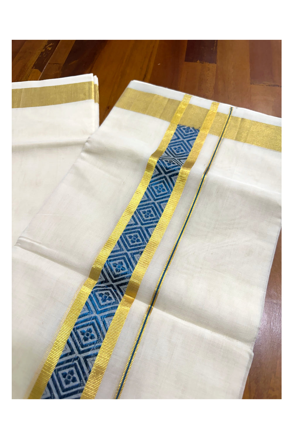 Southloom Premium Handloom Pure Cotton Mundu with Golden and Blue Kasavu Woven Border