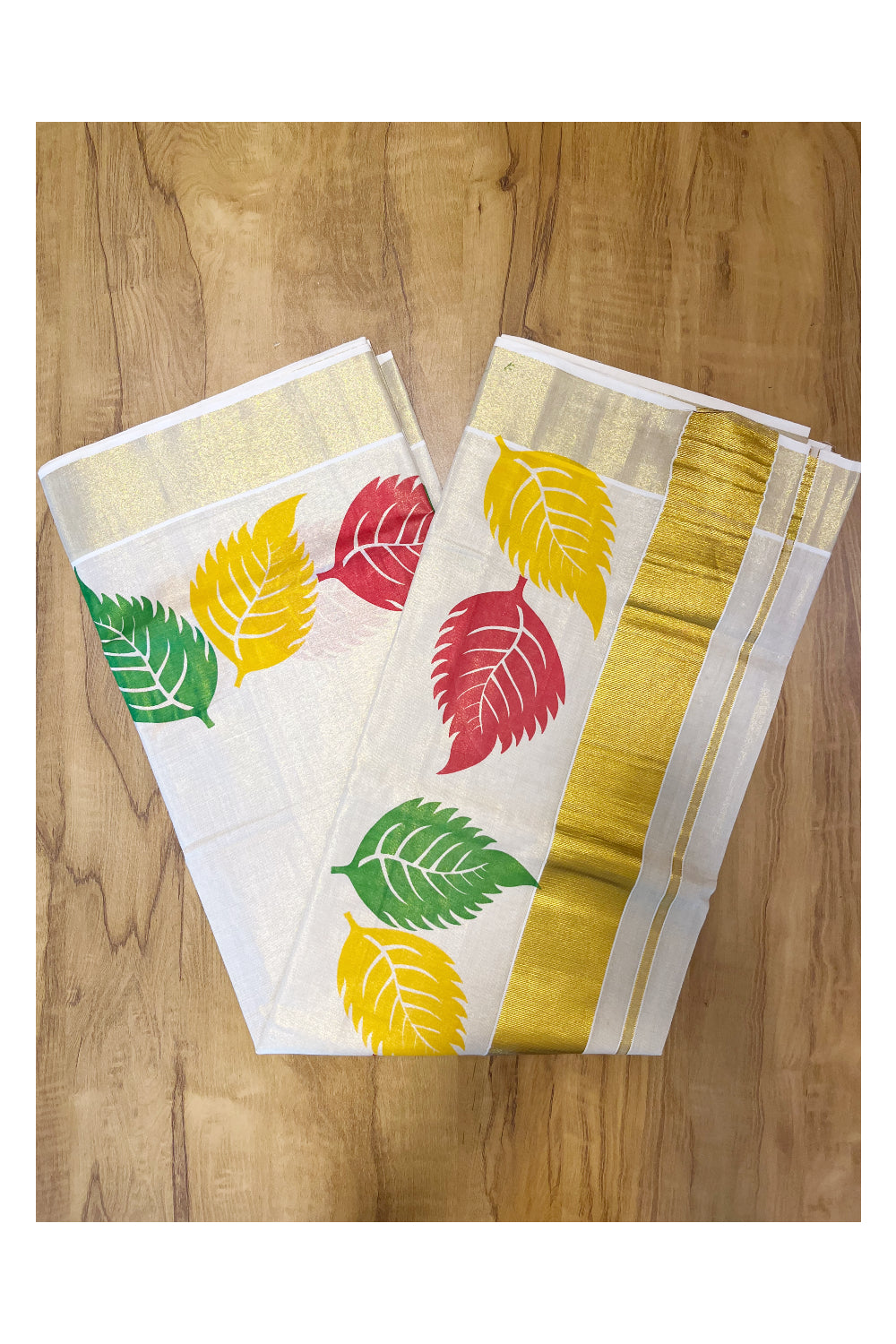 Kerala Tissue Saree with Vibrant Colour Big Leaf Designs on Border