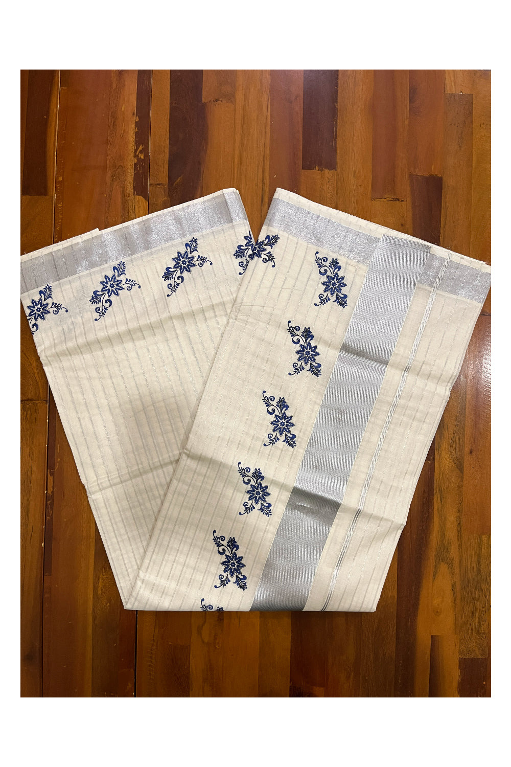 Pure Cotton Kerala Saree with Silver Lines and Blue Floral Block Prints on Border