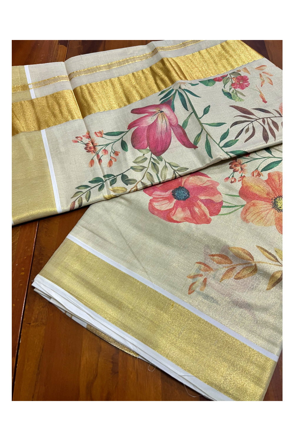 Kerala Tissue Kasavu Saree with Orange And Pink Floral Prints on Body (Vishu 2024 Collection)