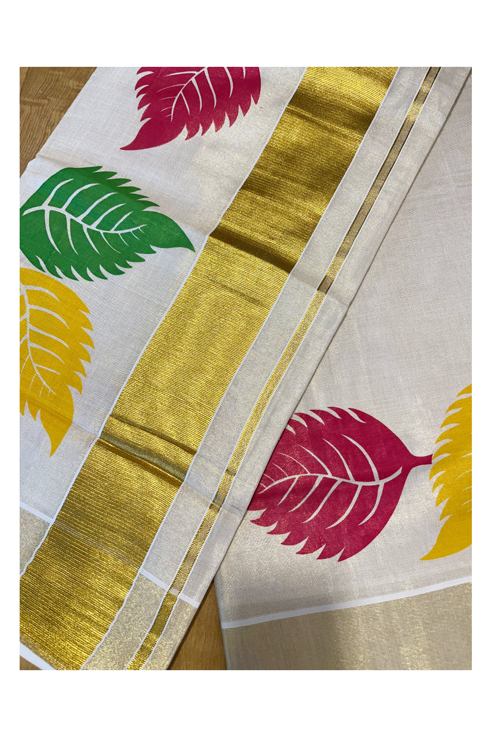 Kerala Tissue Saree with Vibrant Colour Big Leaf Designs on Border