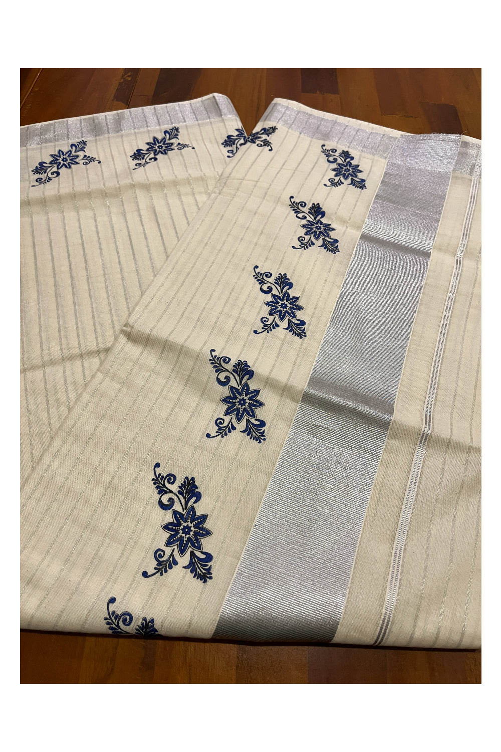 Pure Cotton Kerala Saree with Silver Lines and Blue Floral Block Prints on Border