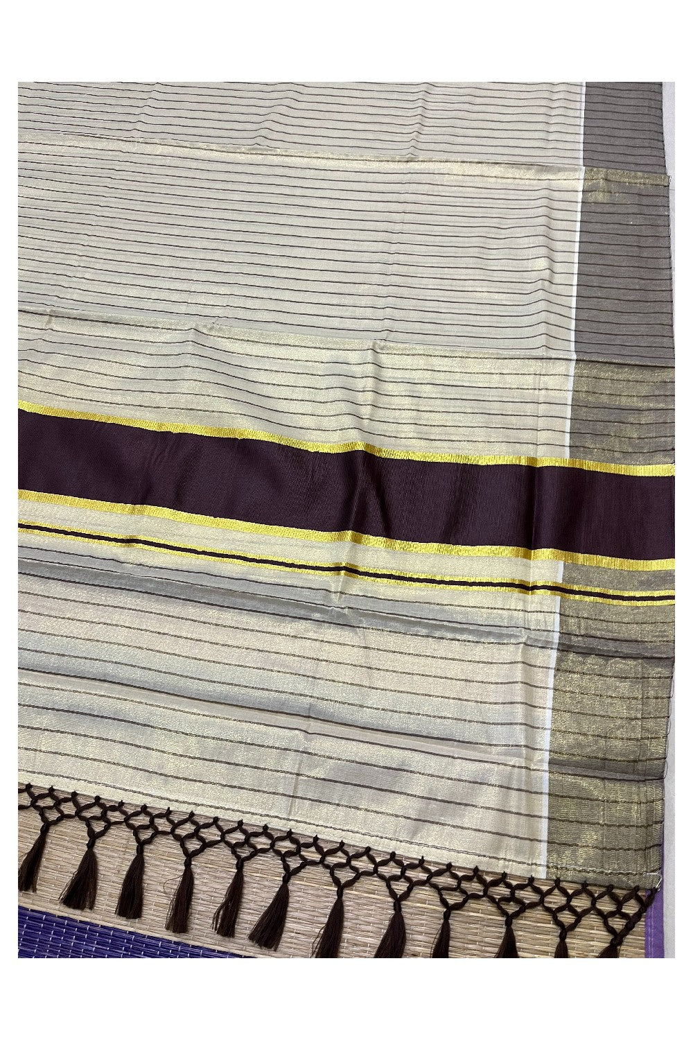 Kerala Tissue Purple Striped Saree with Kasavu Border and Tassels Works