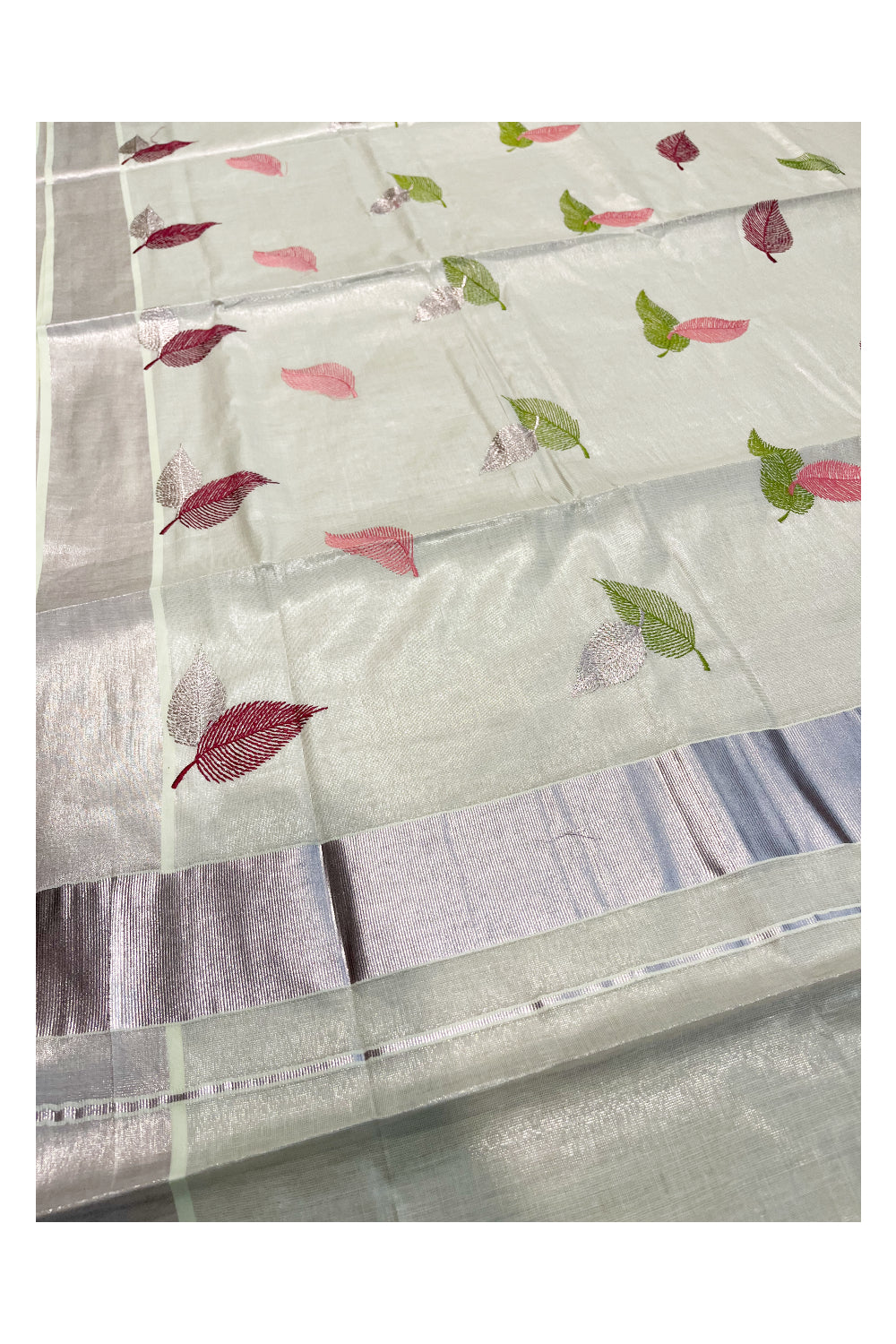 Kerala Rose Copper Kasavu Tissue Saree with Pink And Green Leaf Embroidery Works