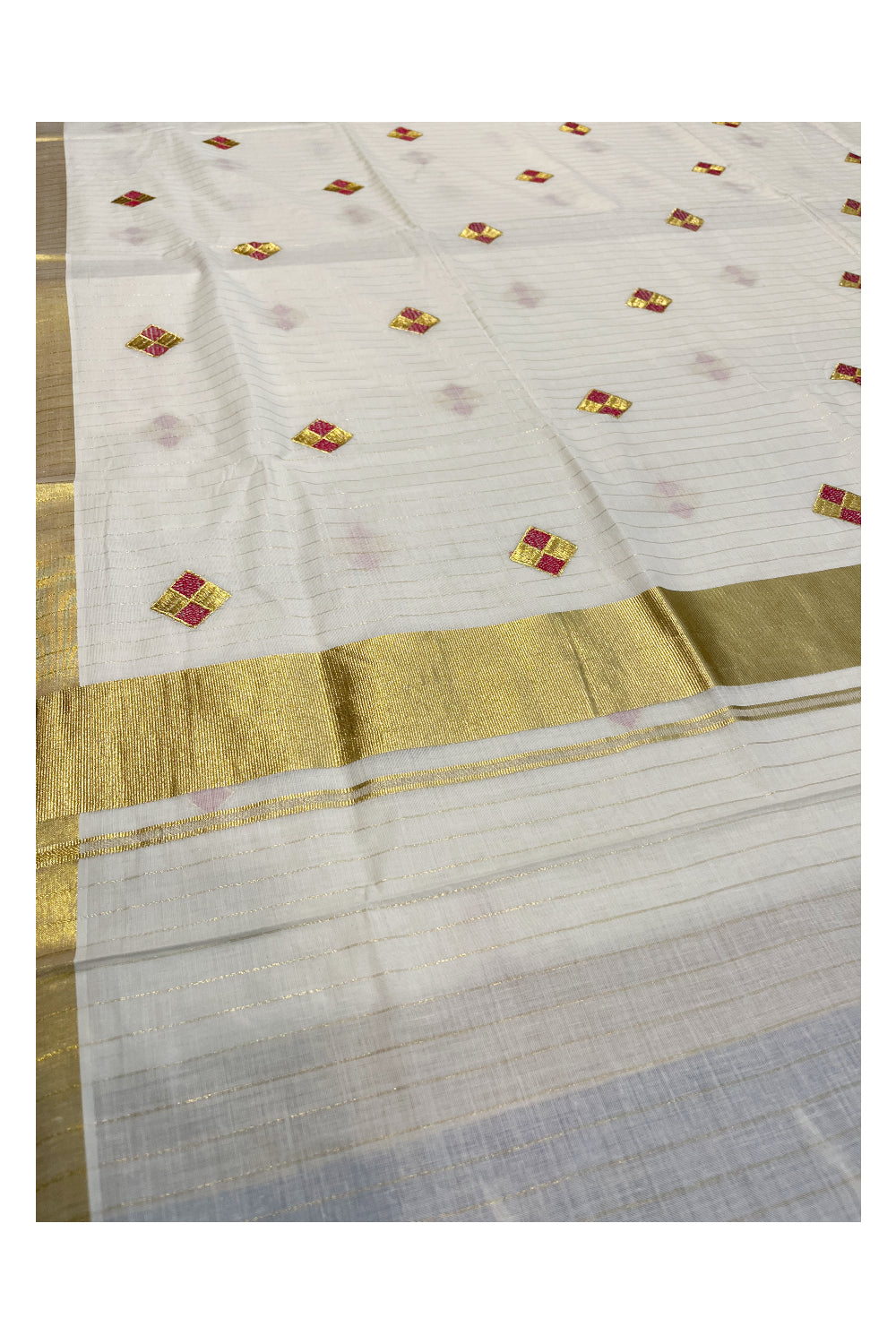 Kerala Cotton Kasavu Lines Saree with Pink and Golden Diagonal Embroidery Work