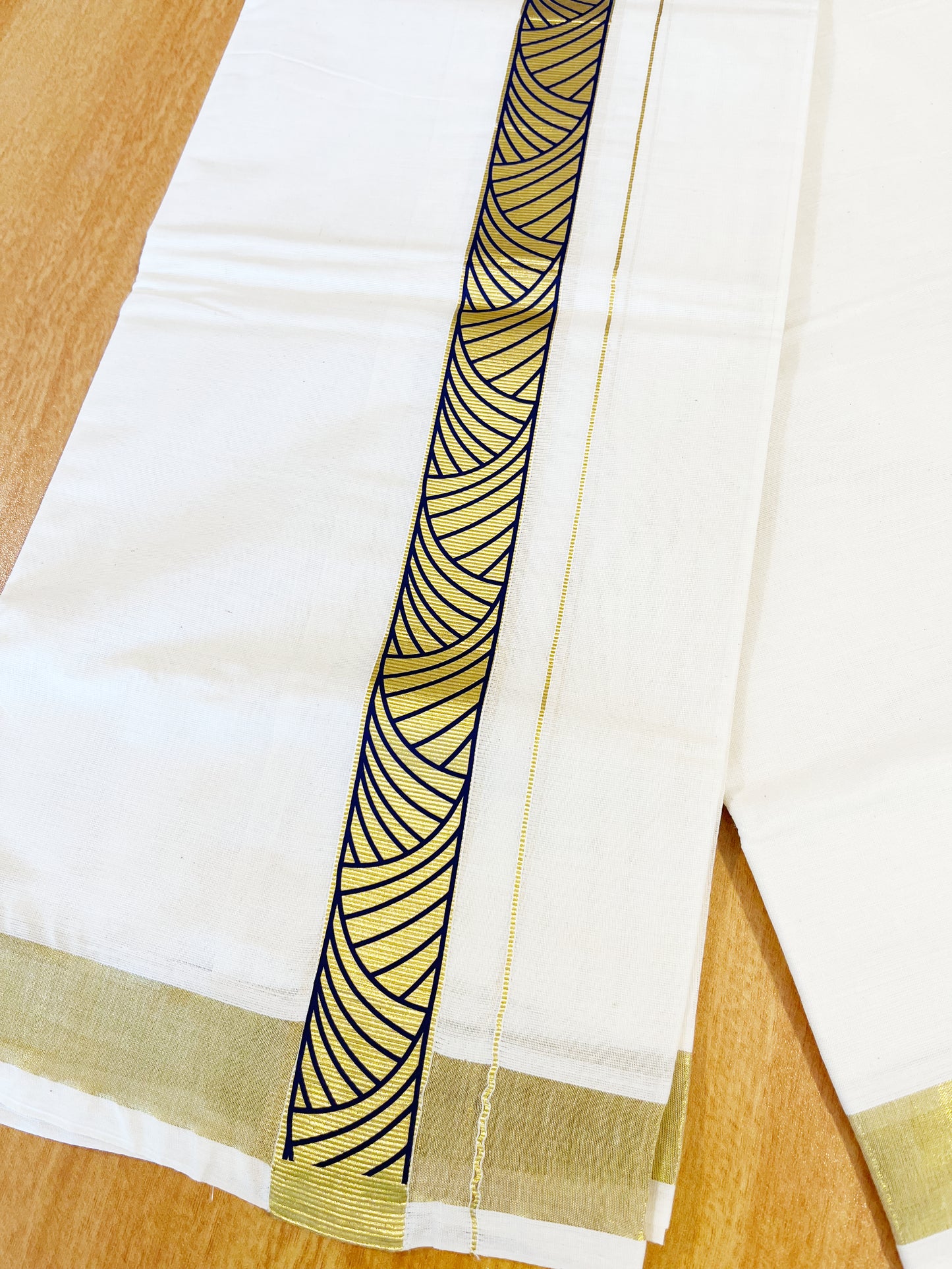 Southloom Kasavu Double Mundu with Blue Prints Along Kasavu Kara