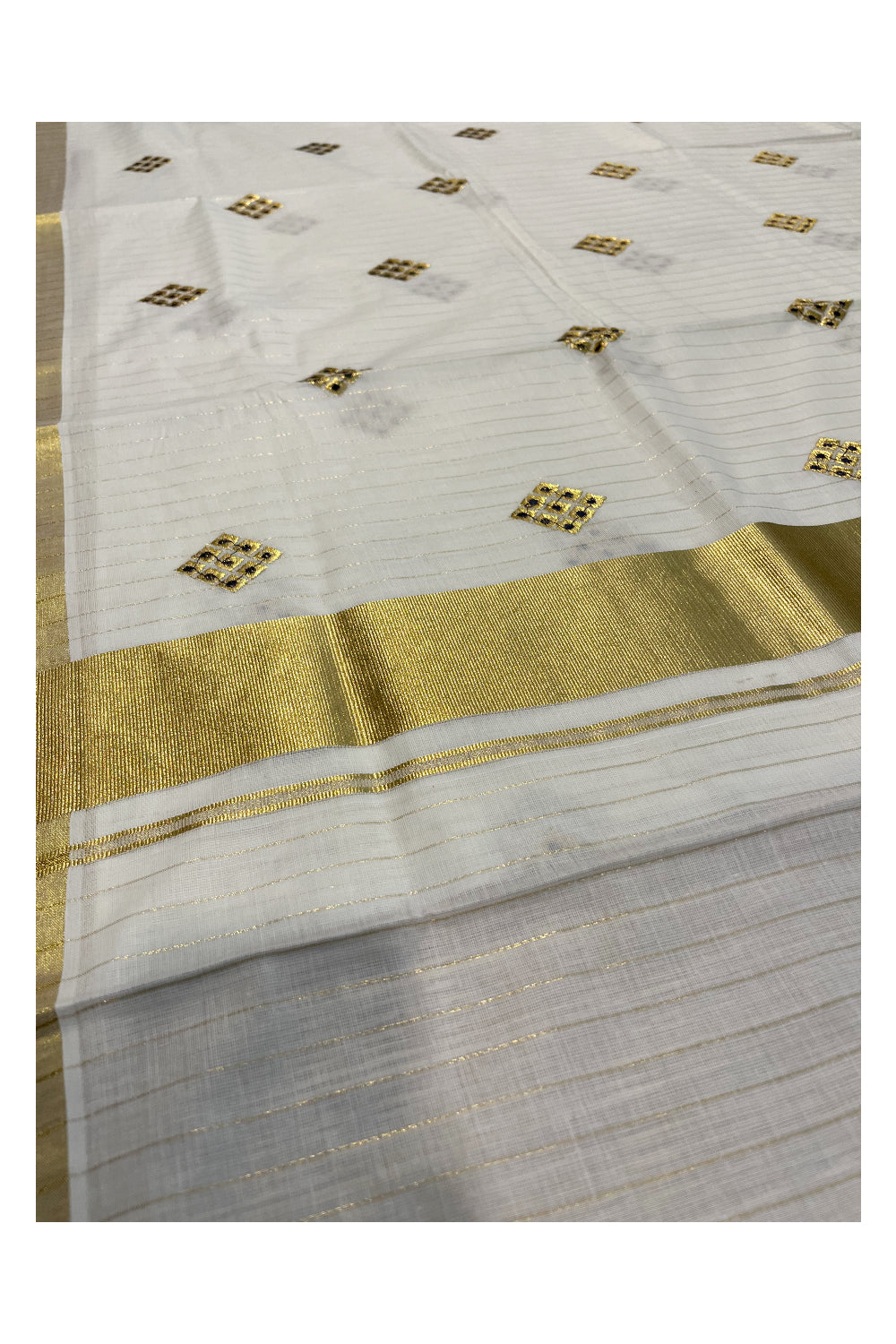 Kerala Cotton Kasavu Stripes Saree with Blue Floral Embroidery Design on Body